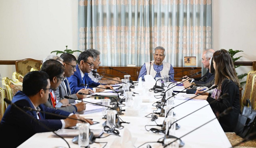Chief Adviser urges reform of labour laws to align with global standards